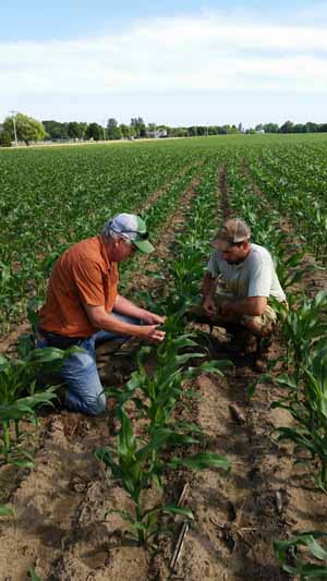 Polenske with client in field