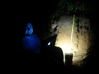 Hirmas with the MLT scanner in soil pit at night