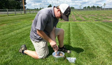 Collecting greenhouse gas samples from turf plots