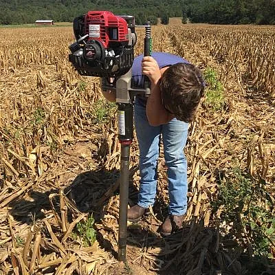 Crop scientist working in a field